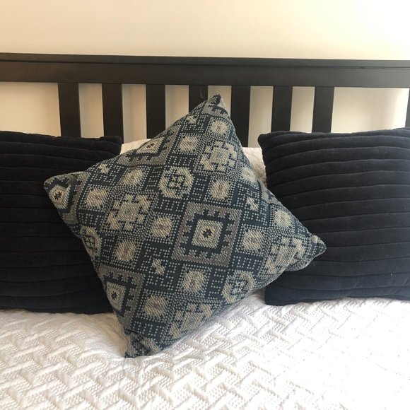 CB2 Navy velvet and accent patterned pillows